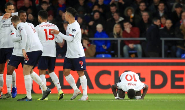 Liverpool extended their unbeaten Premier League streak to 30 games after a 2-1 triumph at Crystal Palace