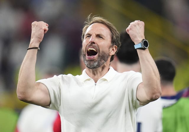 England manager Gareth Southgate clenches his fists in celebration after England beat the Netherlands
