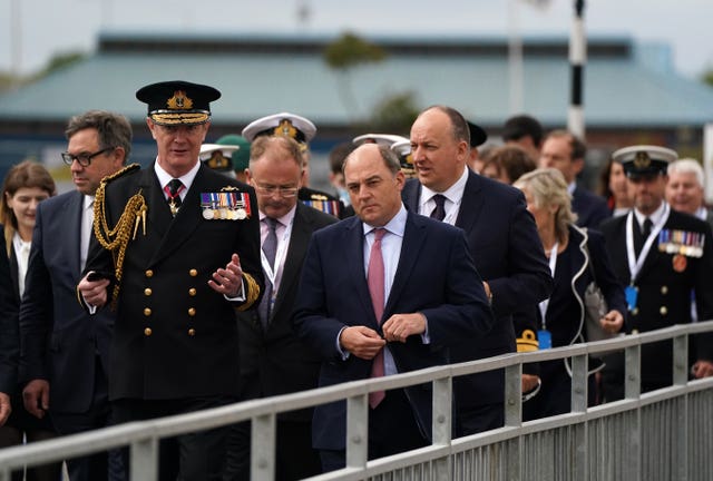 Defence Secretary Ben Wallace alongside Second Sea Lord Nick Hines outside The Venturer Building after a frigate steel cutting ceremony for the first of the class Type 31 frigate, at Babcock Rosyth, Fife