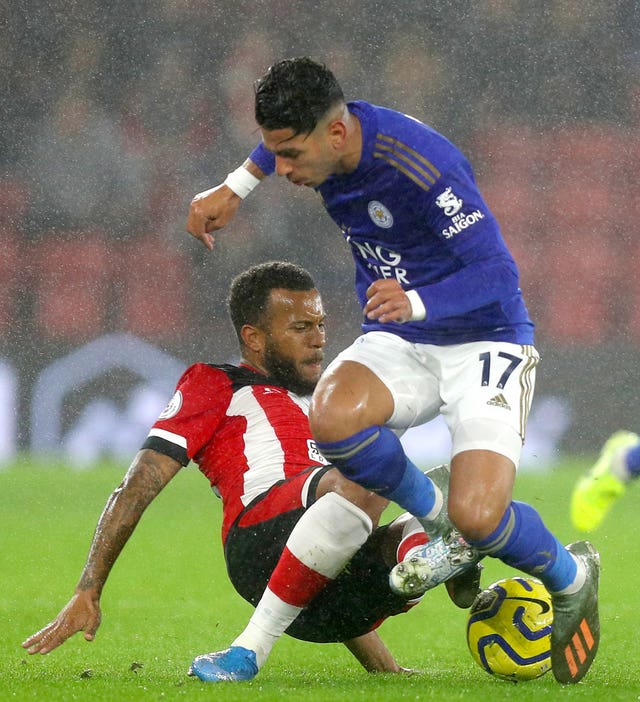 Ryan Bertrand, left, fouls Ayoze Perez and earns a red card given by VAR