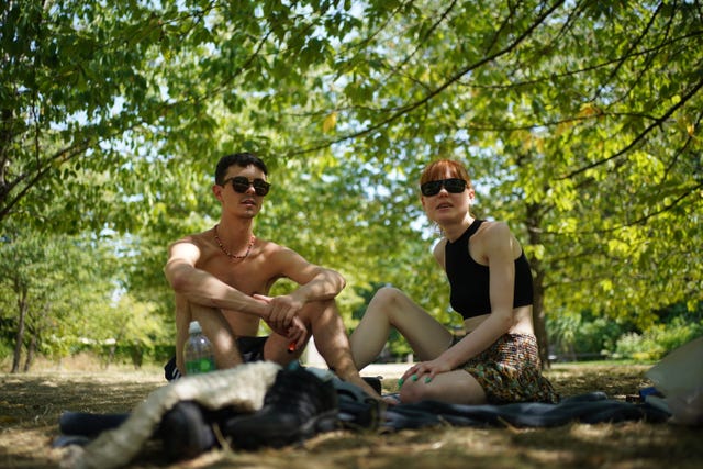 Jerome Yates and Orla Tagg make use of the shade in London’s Regent's Park 