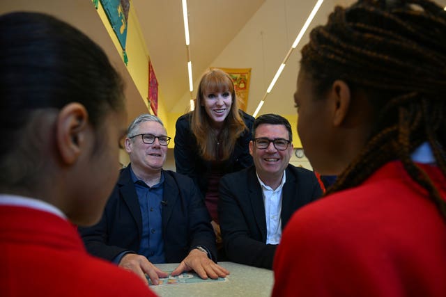 Sir Keir Starmer, Angela Rayner and Andy Burnham during a visit to a school breakfast club