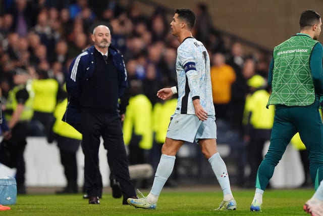 Portugal striker Cristiano Ronaldo walks off the field