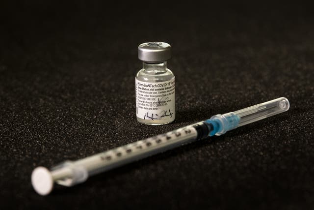 The first ever vial and syringe to be administered of the Pfizer-BioNTech vaccine (Victoria Jones/PA)