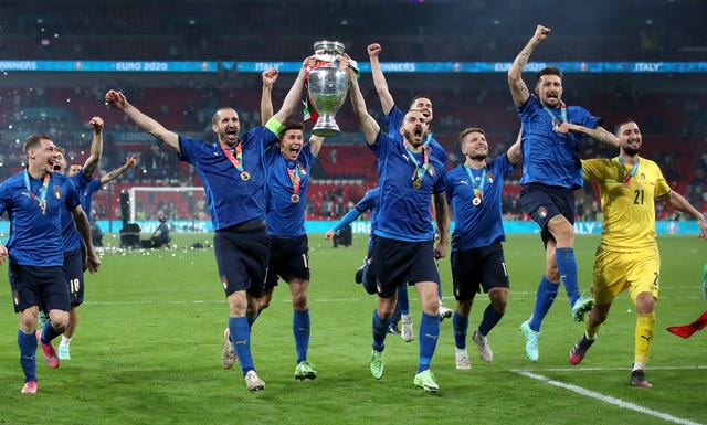 Italy’s Giorgio Chiellini and Leonardo Bonucci lift the European Championship trophy after beating England on penalties at Wembley 