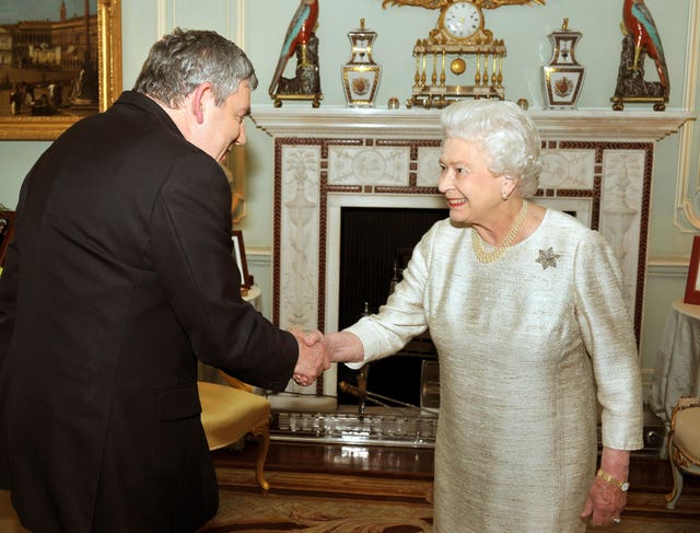 Gordon Brown with the Queen