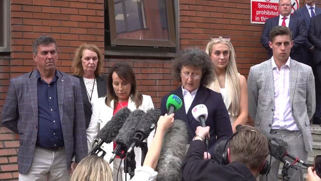 Family liaison officer Linzie Holroyd reading a statement on behalf of Paul Beshenivsky (left), his new wife Michelle (third from left), daughter Lydia Beshenivsky (second from right) and son Paul Beshenivsky Jnr (right) outside Leeds Crown Court