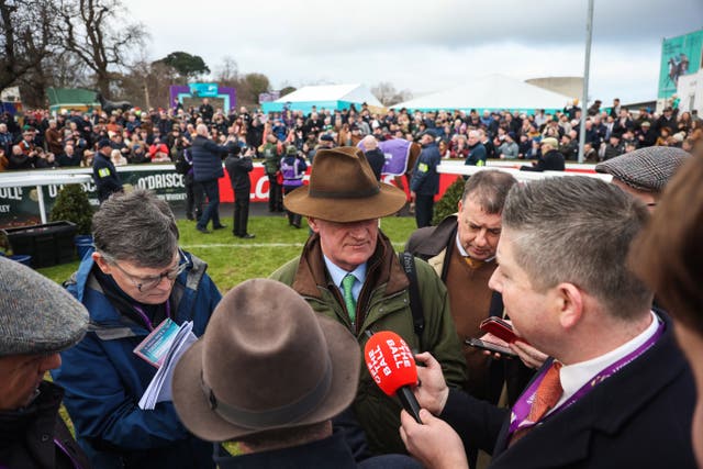 Willie Mullins surrounded by the media at Leopardstown on Sunday