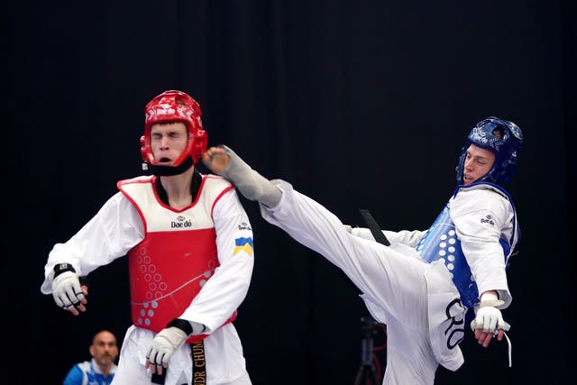 Croatia’s Marko Golubic, right, in action against Ukraine’s Oleksandr Chumachenko during day four of the European Taekwondo Championships at the Manchester Regional Arena 