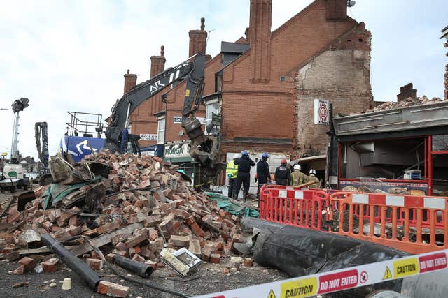 The funeral cortege drove past the scene of the explosion in Hinckley Road, Leicester (Aaron Chown/PA)