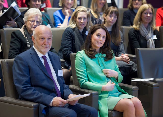 The Duchess of Cambridge sits alongside Peter Fonagy, chief executive of the Anna Freud Centre, at a symposium of leading academics and charities championing early intervention into the lives of children (Geoff Pugh/The Daily Telegraph/PA)