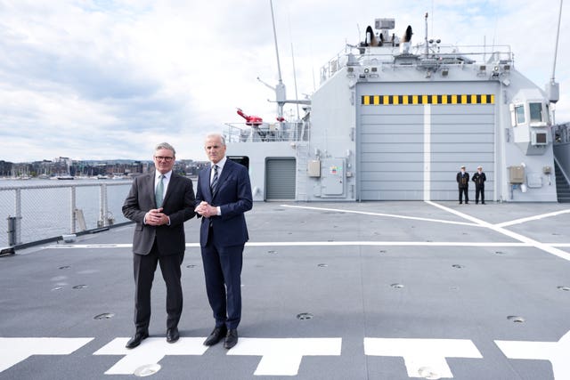 Sir Keir Starmer (left) meets Norwegian Prime Minister Jonas Gahr Store on the Norwegian coastguard vessel Jan Mayen in Oslo