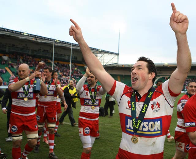 Gloucester wing Tom Voyce celebrates with fans after beating Newcastle 