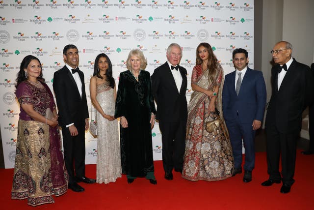 Charles and Camilla with guests including Priti Patel and Rishi Sunak