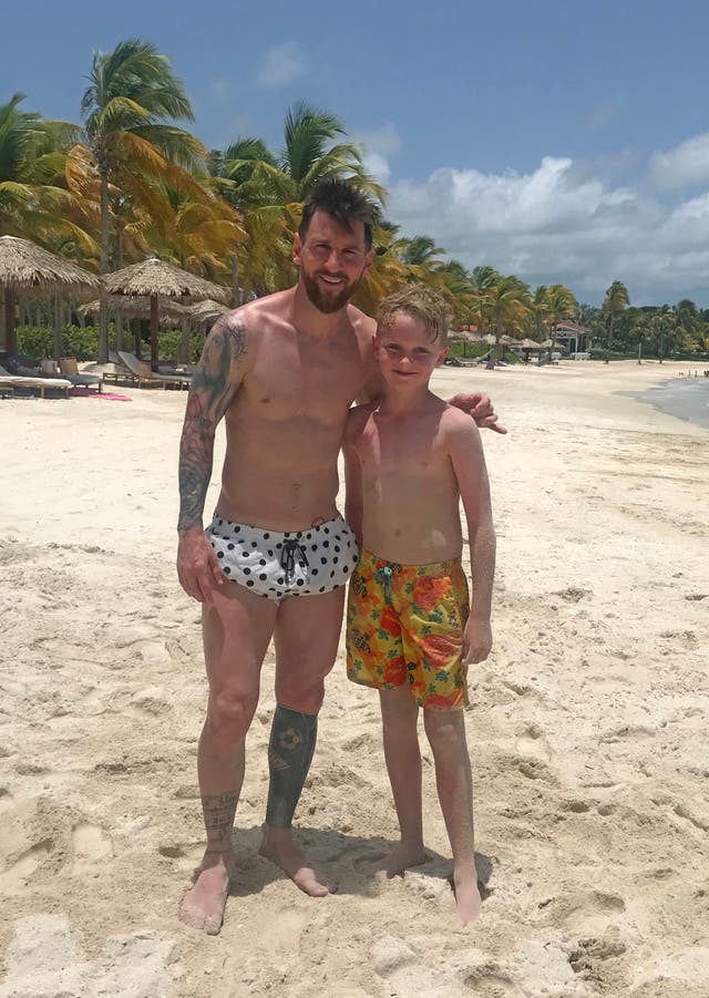 Mackenzie O’Neill with Lionel Messi while on holiday in Antigua