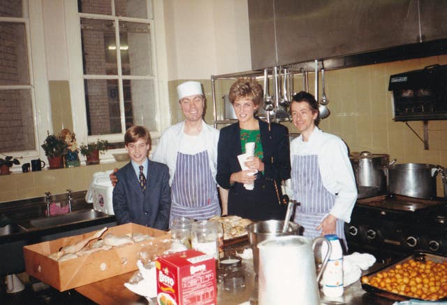 William and Diana, Princess of Wales during a visit to the kitchen of The Passage just before Christmas 1993