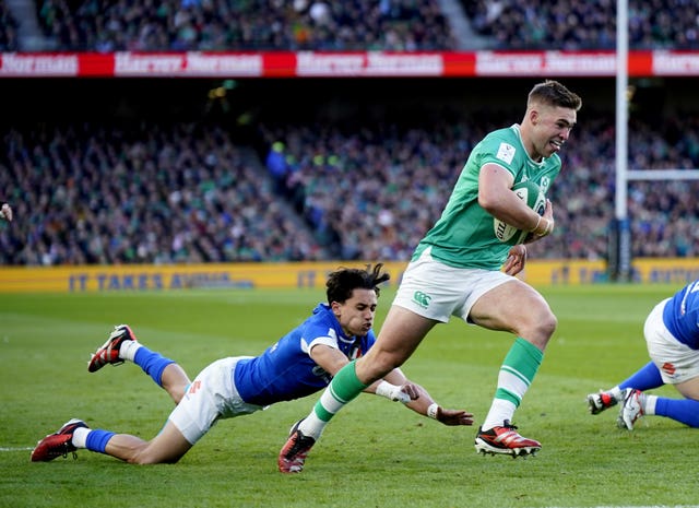 Jack Crowley's maiden senior try set Ireland on course for a routine win over Italy in round two