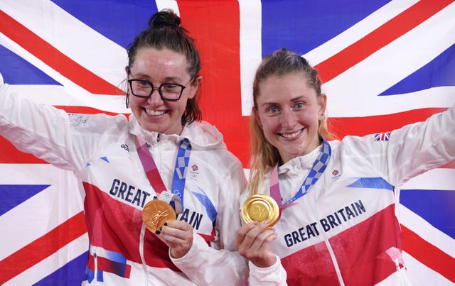 Great Britain's Katie Archibald (left) and Laura Kenny celebrate with their gold medals after winning the women's Madison