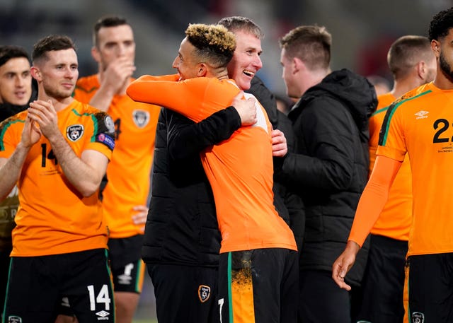 Republic of Ireland manager Stephen Kenny and Callum Robinson embrace at full-time