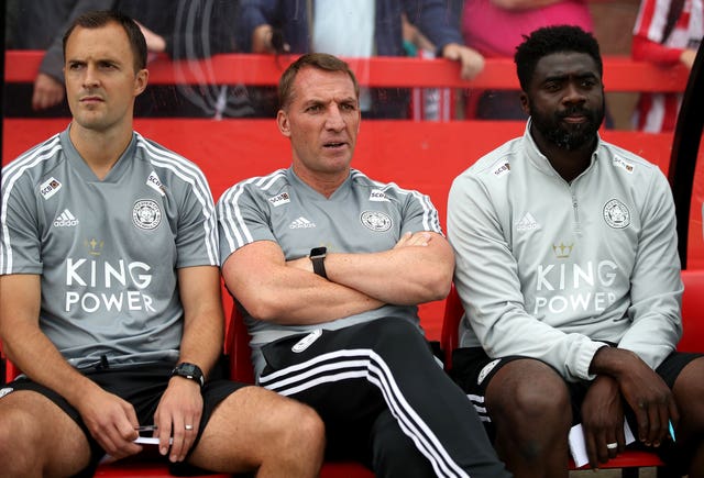 Kolo Toure (right) with Brendan Rodgers (centre) during his time at Leicester (Nick Potts/PA).