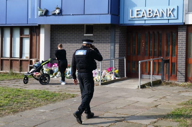 Police at Leabank in Luton, Bedfordshire, after the murders 