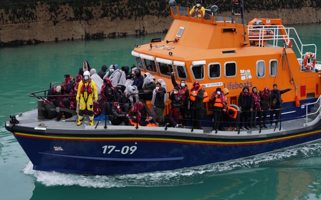 A group of people thought to be migrants (Gareth Fuller/PA)