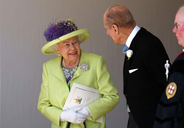 The Queen wore the same brooch to the Sussexes' wedding in 2018 (Alastair Grant/PA)