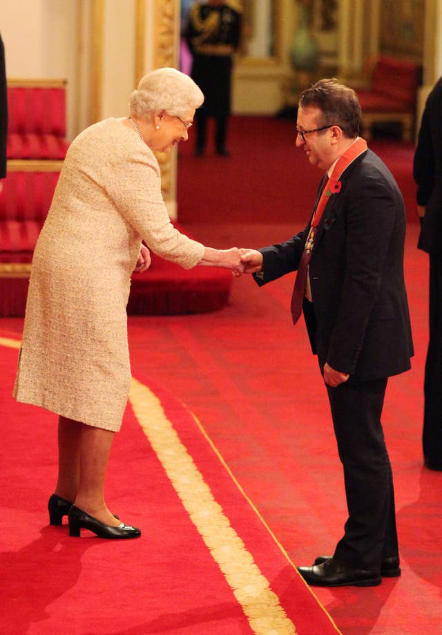 Mark-Anthony Turnage when he became a CBE with the late Queen at Buckingham Palace