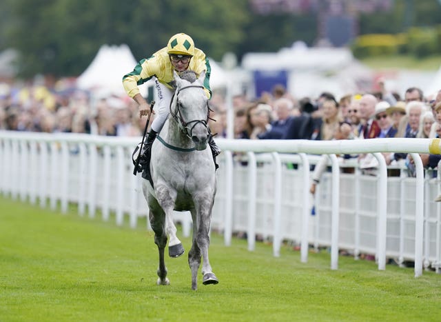 Lord Riddiford winning his third Coral Handicap 