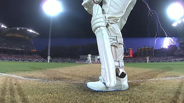 Image from the stump cam as Dawid Malan faces up as lightning strikes (BT Sport)
