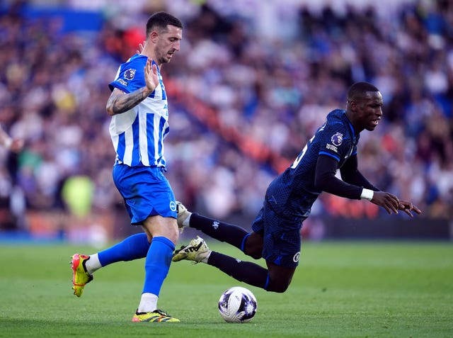 Brighton captain Lewis Dunk, left, was forced off injured against Chelsea 