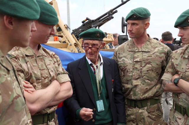 Veteran Trevor Stacy meets members of the Royal Marines 