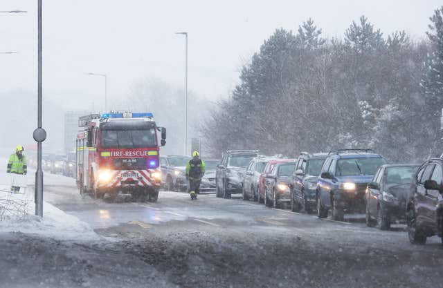 Traffic on a road off the A30 near Okehampton in Devon (Martin Keene/PA)