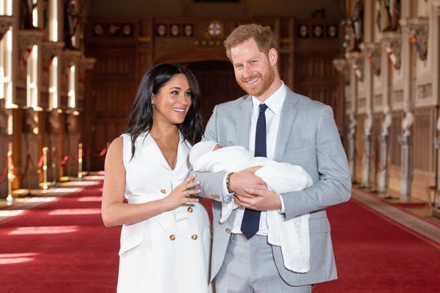 Meghan and Harry show off their newborn son to the world. Dominic Lipinski/PA Wire