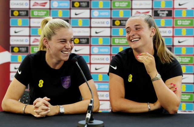 England’s Alessia Russo (left) and Ella Toone react as they speak to the media at St George’s Park, Burton upon Trent. 