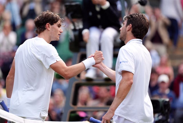 Jack Draper (left) and Cameron Norrie shake hands after their match
