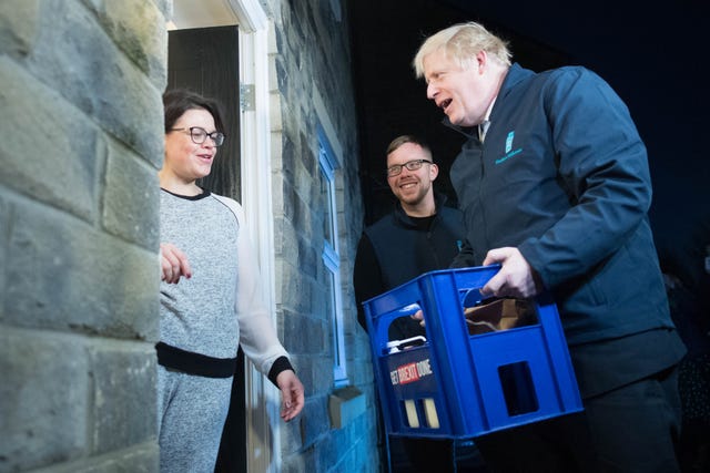 Boris Johnson delivers milk to Debbie Monaghan in Guiseley