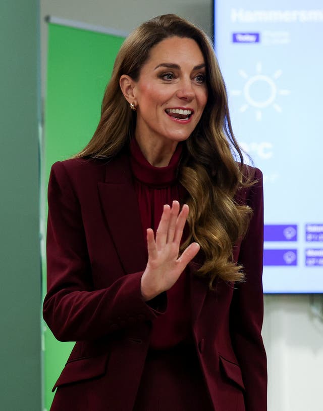 The Princess of Wales waves hello during a visit to Charing Cross Hospital