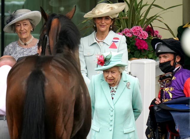 Queen Elizabeth II with Reach For The Moon at Royal Ascot in 2021