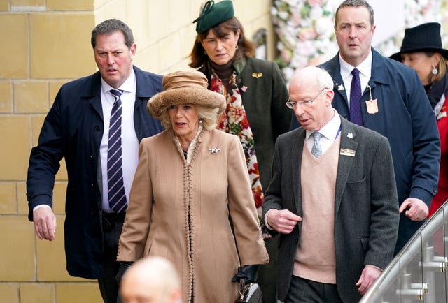 The Queen Consort speaks to Regional Director of Cheltenham Racecourse Ian Renton (Andrew Matthews/PA)