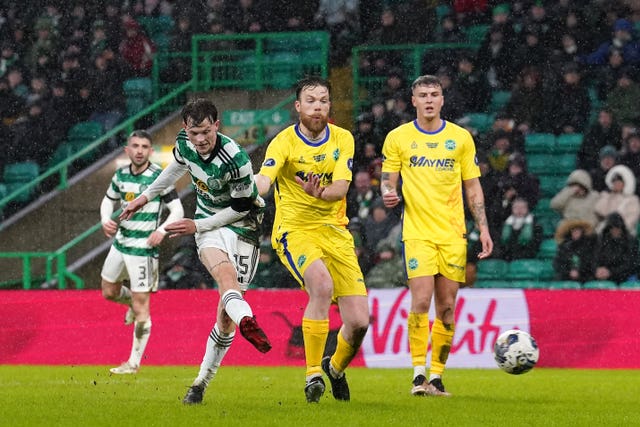 Odin Thiago Holm, left, scores Celtic’s second goal