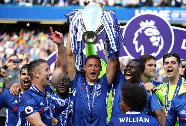 Nemanja Matic lifts the Premier League trophy with Chelsea in 2017