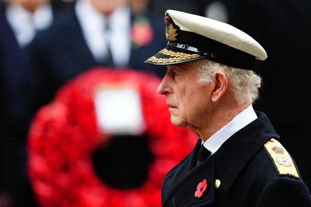 The King in uniform during the Remembrance Sunday service at the Cenotaph in London