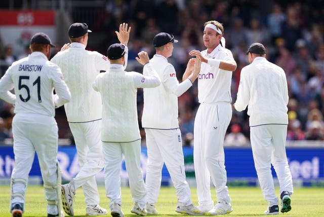 Stuart Broad (second right) celebrates with his England team-mates