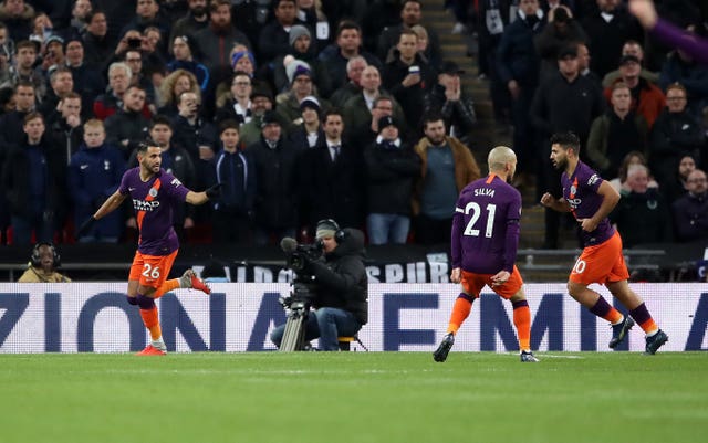 Riyad Mahrez celebrates scoring against Tottenham