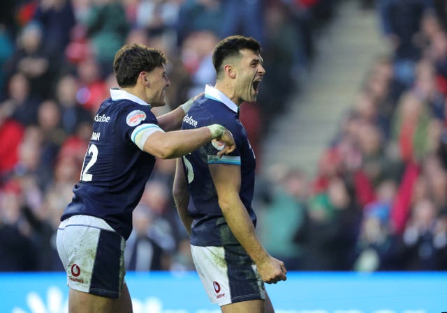 Blair Kinghorn celebrates scoring against Wales