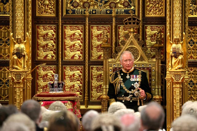 The Prince of Wales delivers the Queen’s Speech during the State Opening of Parliament in the House of Lords, London
