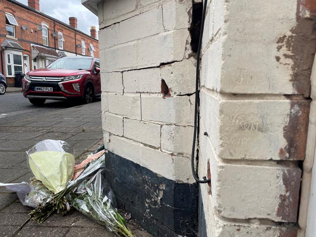 Brickwork near a property's front door etched by Ozzy Osbourne as a child