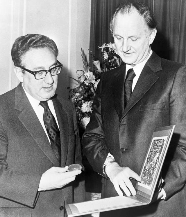Henry Kissinger receiving his Nobel Peace Prize at Claridge’s Hotel in London