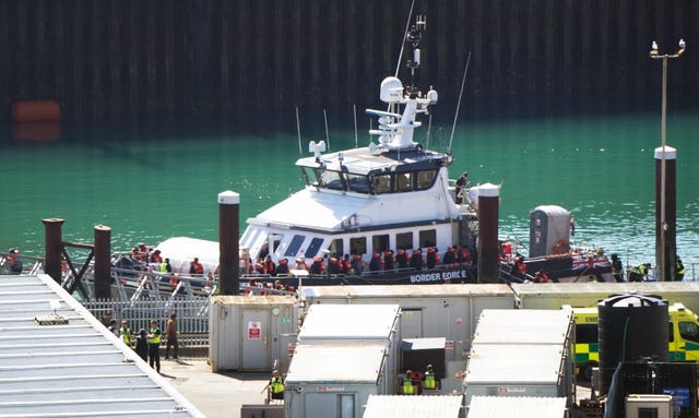 A group of people thought to be migrants are brought in to the Border Security Command compound in Dover, Kent, from a Border Security Command vessel following a small boat incident in the Channel